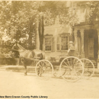 Mr. W.L. Lewis, New Bern, N.C. in front of the Whitford home. [Smith-Whitford House, corner of Change and Craven Streets]
