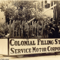 Colonial Filling Station parade float