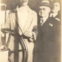 C.L. Abernethy and two others at wheel of United States Coast Guard Cutter Pamlico